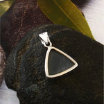 Triangular silver pendant 